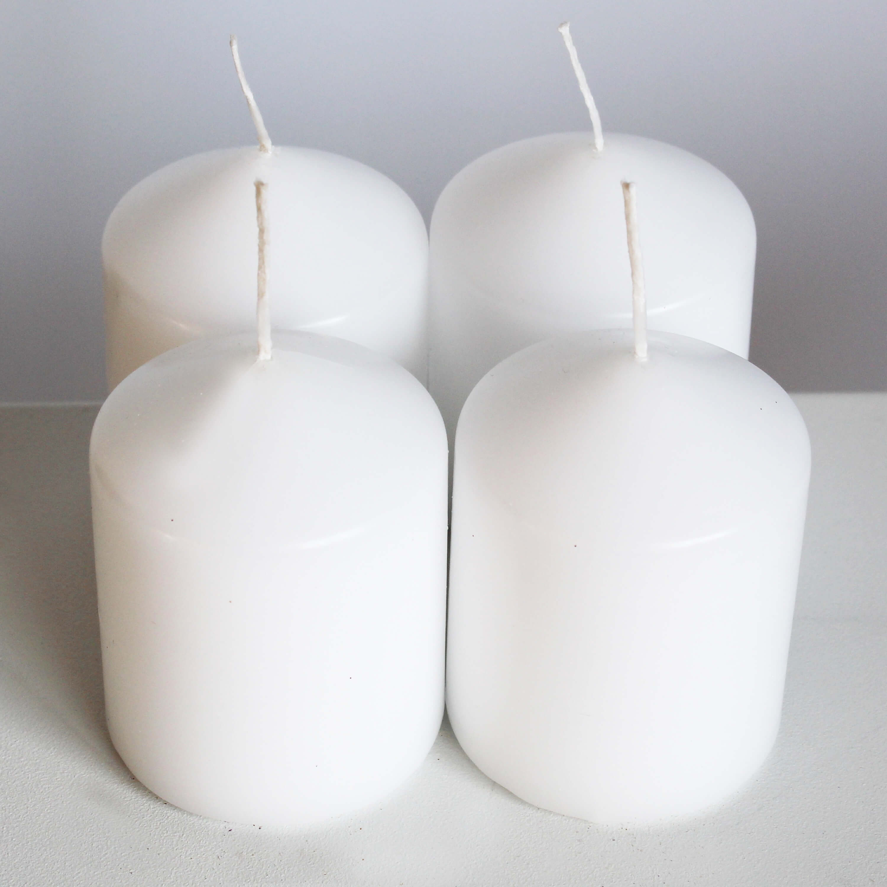 Adventní svíčky pr.60x80mm bílé